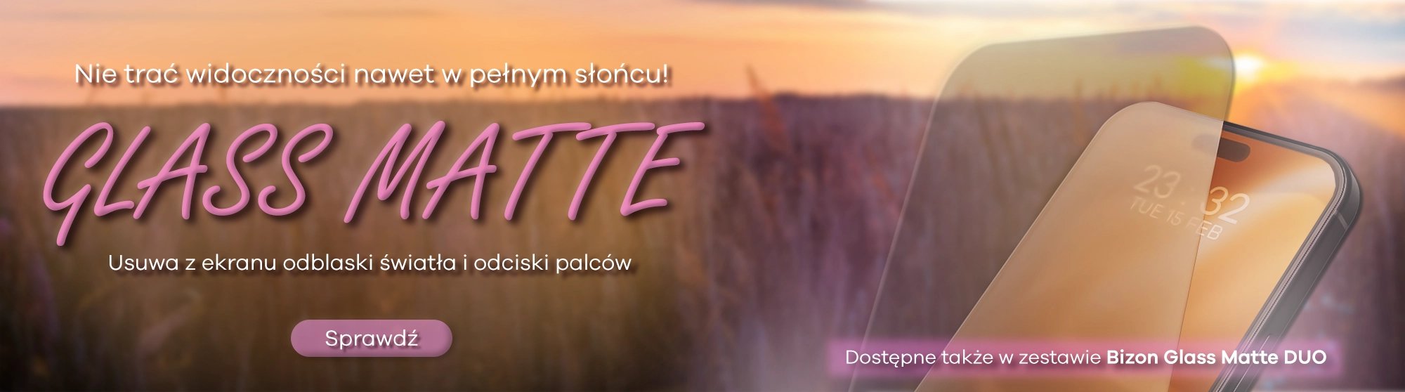 Smartfon z matowym ekranem na tle zachodu słońca, z tekstem o bezpieciństwie i odbiciach światła